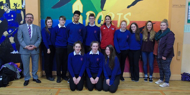 Olympic Hurdler Jessie Barr is pictured with a group of Transition Year students, Principal Mr John Cooke (left), and teachers Ms Lisa McMahon and Ms Martina McNamara (right). Ms Barr is giving a six week course on fitness to the class.